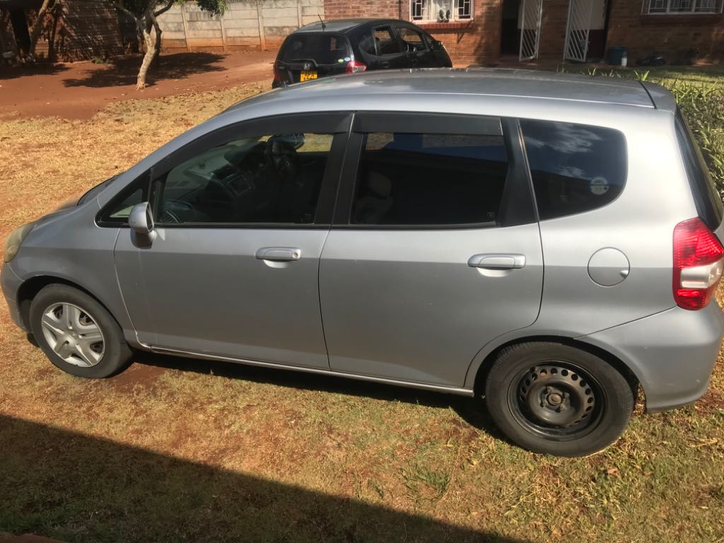 A picture of Silver Honda Fit for sale 