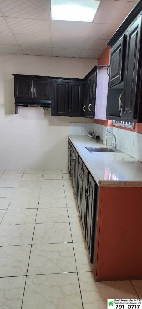 A picture of 1 Bedroom Upstairs Apartment in Arouca Utilities Included 3 000