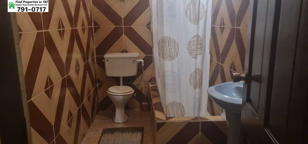 A picture of Fully Furnished 2 Bedroom Apartment in Cunupia Private Bathrooms in