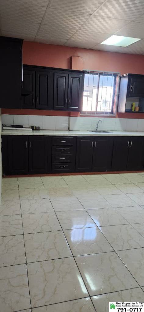 A picture of 1 Bedroom Upstairs Apartment in Arouca Utilities Included 3 000