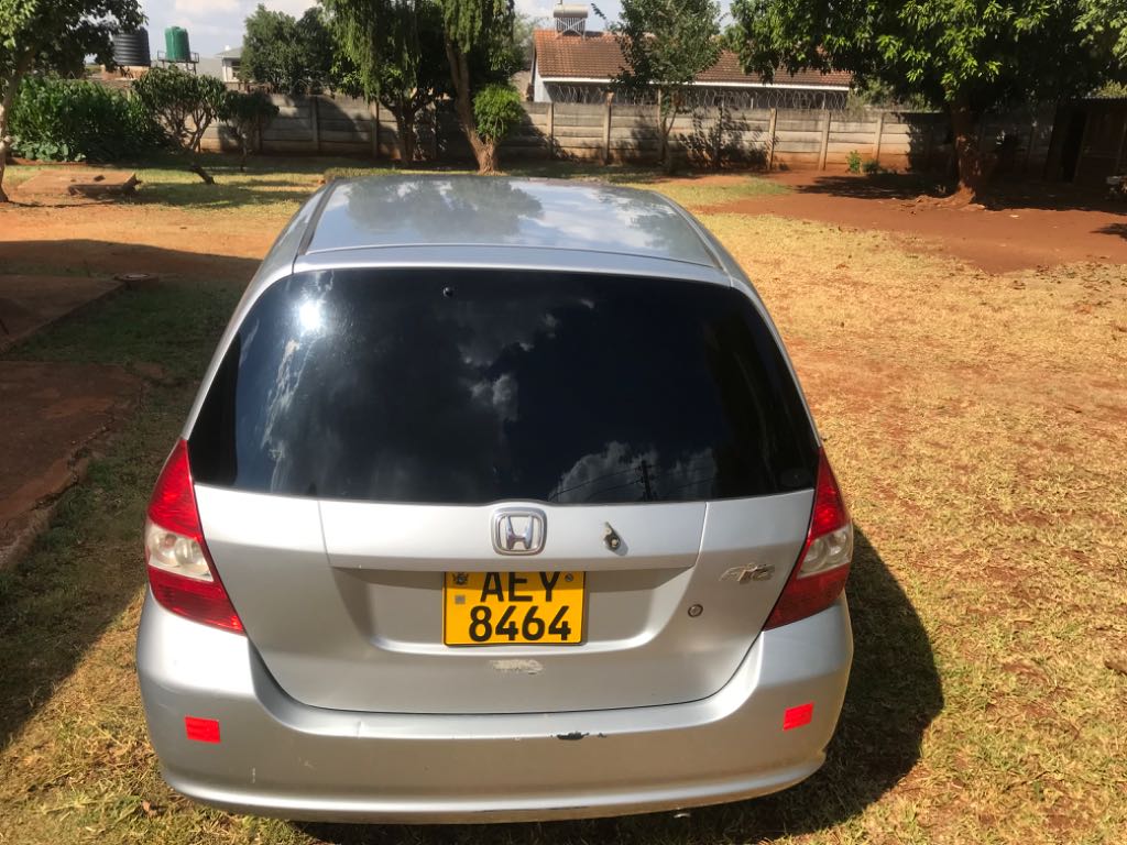 A picture of Silver Honda Fit for sale 