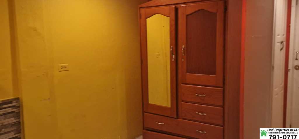 A picture of Fully Furnished 1 Bedroom Apartment in Arouca Utilities Included 2
