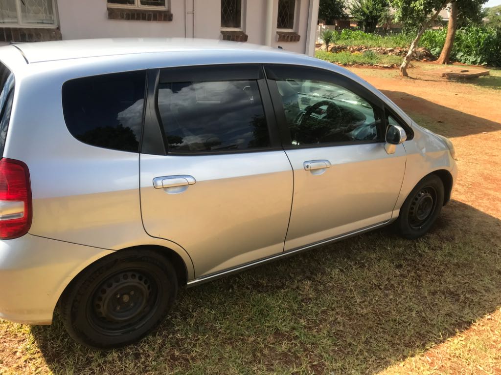 A picture of Silver Honda Fit for sale 
