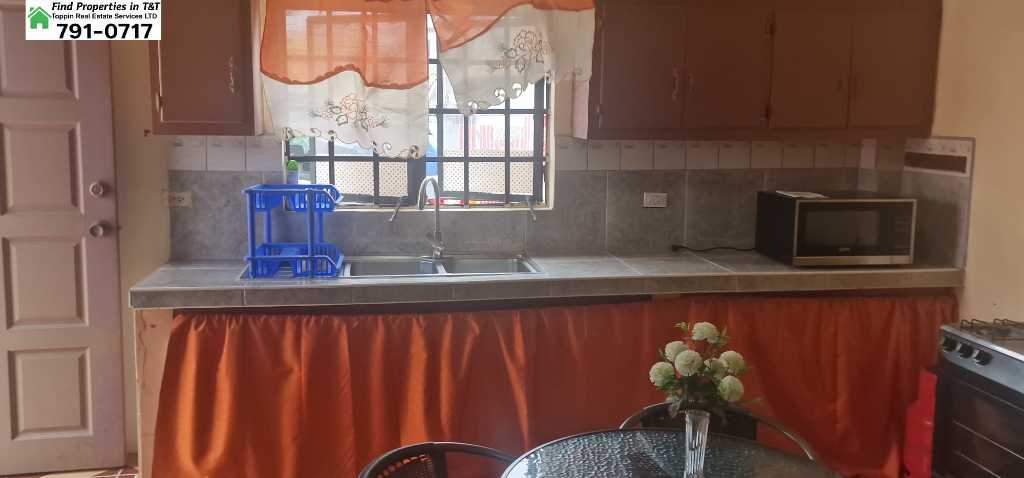 A picture of Fully Furnished 2 Bedroom Apartment in Cunupia Private Bathrooms in