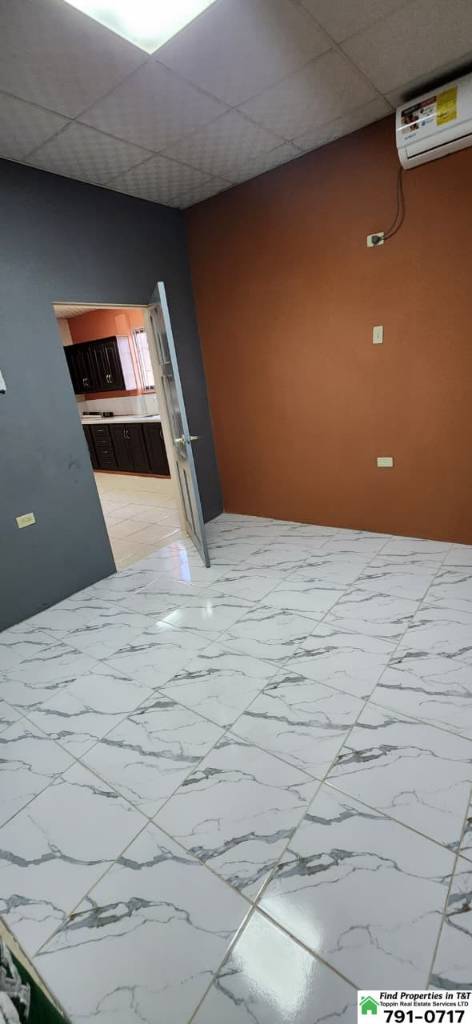 A picture of 1 Bedroom Upstairs Apartment in Arouca Utilities Included 3 000