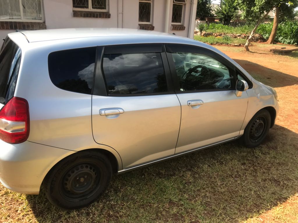 A picture of Silver Honda Fit for sale 