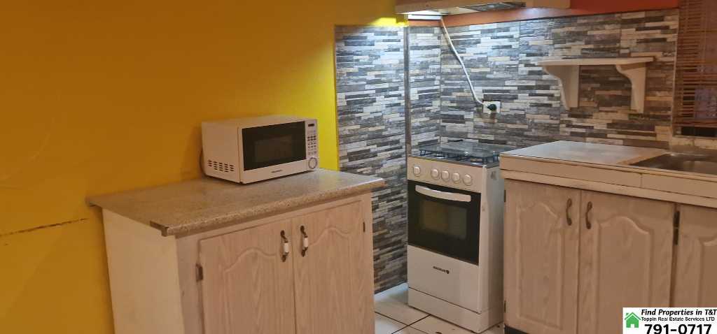 A picture of Fully Furnished 1 Bedroom Apartment in Arouca Utilities Included 2