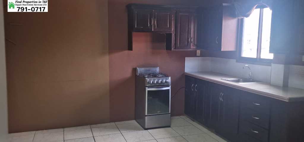 A picture of Fully Furnished 1 Bedroom Apartment in Arouca Utilities Included 3