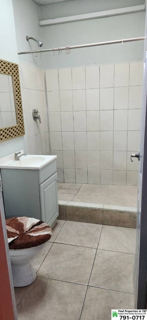 A picture of 1 Bedroom Upstairs Apartment in Arouca Utilities Included 3 000