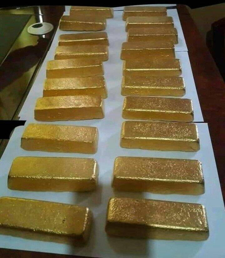 A picture of Gold bars and nuggets