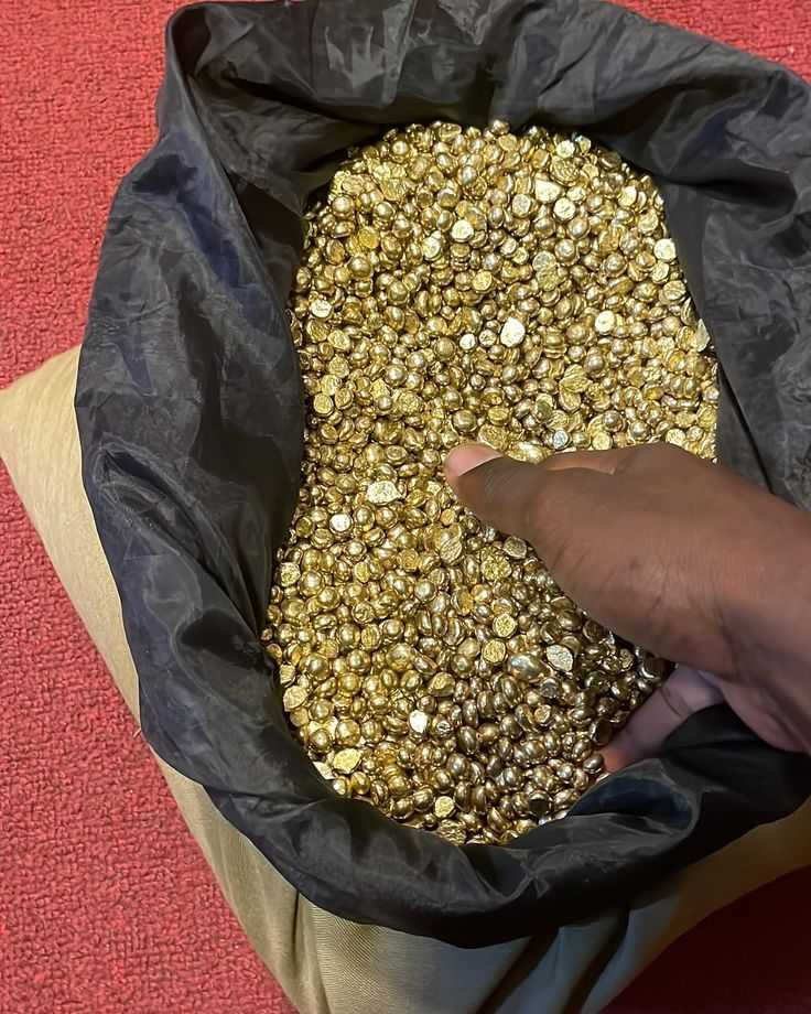 A picture of Gold bars and nuggets