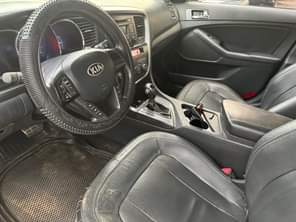 A picture of Distress very clean Kia Optima 2014 model with everything intact