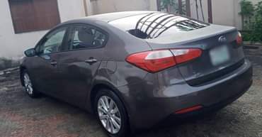 A picture of 2015 model Kia cerato keyless engine and gear ac chilling