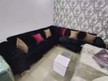 A picture of 8 Seater Set Of L shape chair black and green