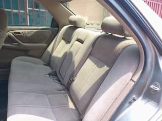 A picture of Super clean Toyota Camry 1999 Model. Tiny light 