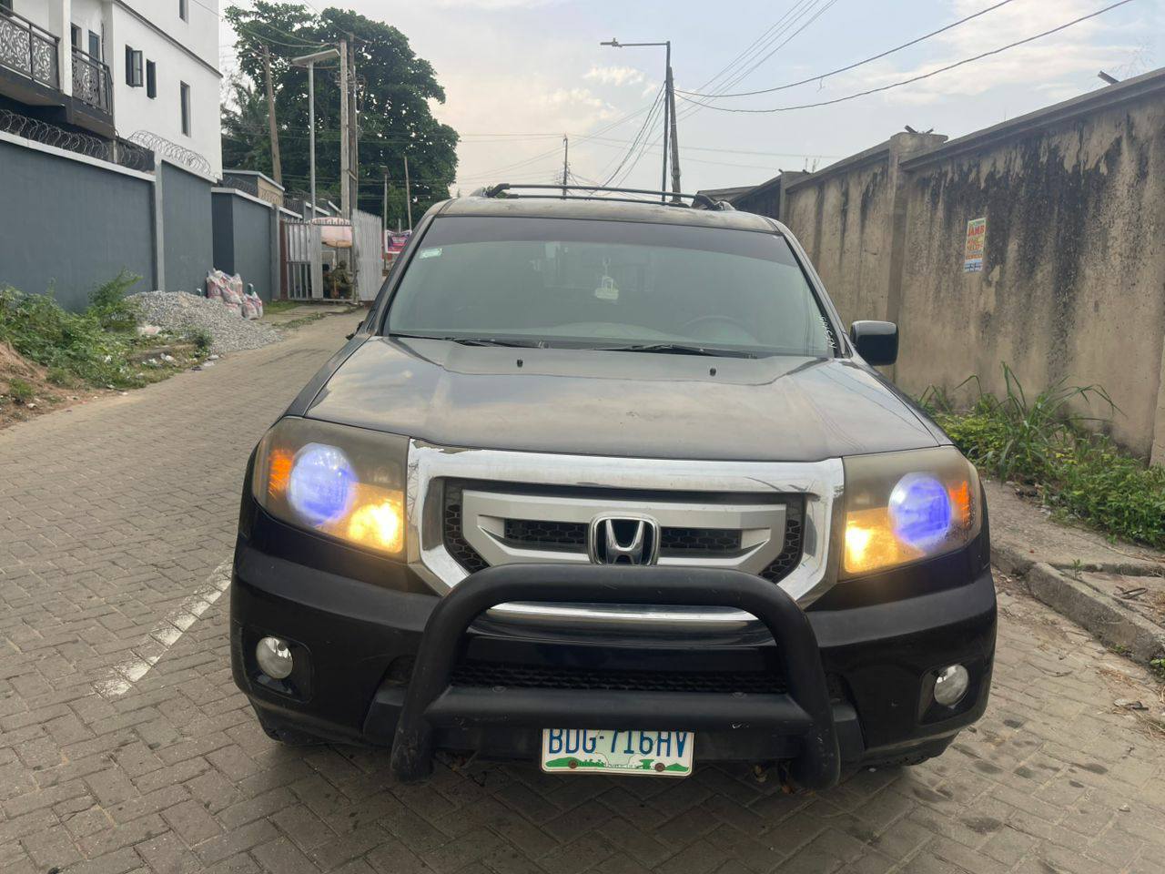 A picture of Honda Pilot 2011 Registered 5.7m first body pan at Ogba