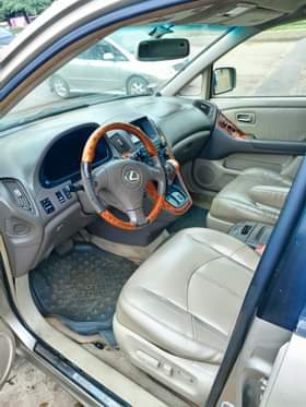 A picture of Extremely clean Lexus Rx 300 With untermpered Engine gear AC