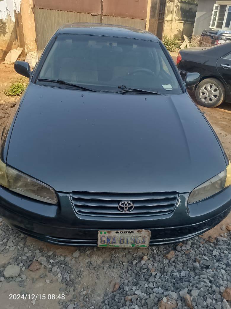 A picture of Toyota Camry. 2.6m negotiable
