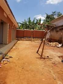 A picture of 7double rooms for sale at nansana kabulengwa seated on 60by