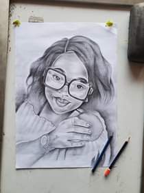 A picture of Surprise your loved ones with a pencil portrait at a