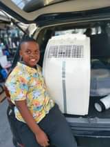 A picture of Mteja amekuja kununua PORTABLE AC dukani KINONDONI JUA linawaka na