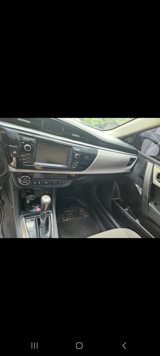 A picture of 2014 TOYOTA COROLLA 10 500 000