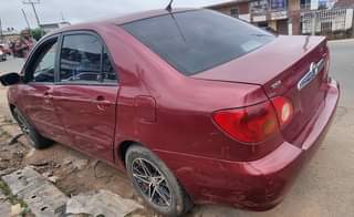 A picture of 2004 registered corolla baked on first body no filler cool