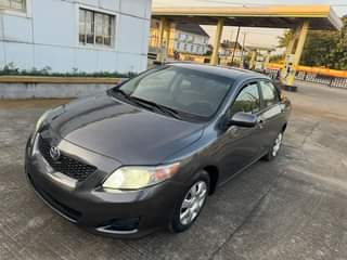 A picture of Few months registered 2010 Toyota Corolla LE flash on first