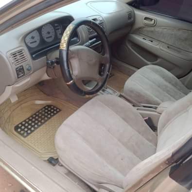 A picture of Corolla 2001 Engine Gear AC Needs Gas Clean fabric interior