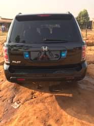 A picture of Clean Nigerian Used Black Honda Pilot Repainted on first body