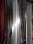 A picture of Curtains and rode 