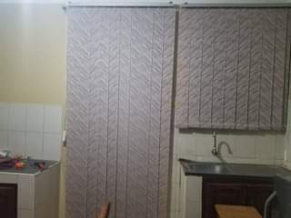 A picture of CURTAINS CARPETS
