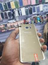 A picture of Samsung s7 double line an 280 slightly negotiable 0755656909 available
