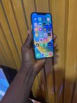 A picture of Clean 2months used chips unlock iPhone 12pro max buy and