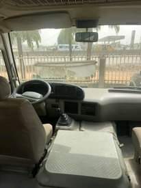A picture of White Toyota coaster bus...3RZ engine...year 2015...AC working perfectly... price 22m