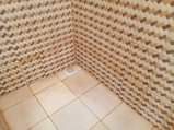 A picture of Mini Single rm for rent UGX80k in Kawempe Jinjakaloli. Fenced