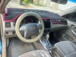 A picture of well baked Corolla with 2009 untempered engine and gear Price