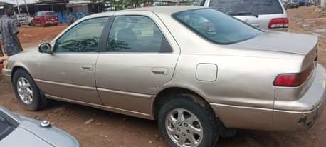 A picture of Clean Nigerian Used Toyota Camry tiny light Fabric interior Sound