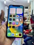 A picture of iPhone 11 64gb Pro faceid working Battery message 1 3M