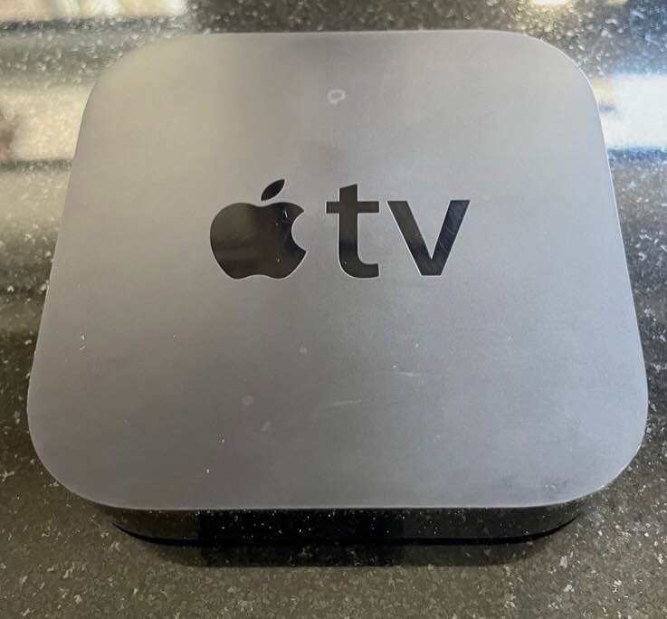 A picture of Apple TV A1469 3rd Gen WiFi 1080P HD Apple Remote