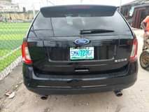 A picture of Ford edge 2011 Ac Gear Engine is tapping Clean in