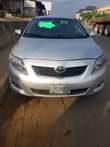 A picture of 2010 toyota corolla Body has been sprayed AC need work