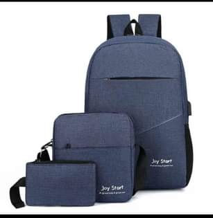 A picture of laptop and school backpack bags