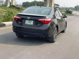 A picture of Toks standard 2015 corolla sport 2020 on custom Carefully driven