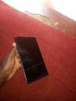 A picture of Lenovo tab 16gb 2gb ram small crack big screen