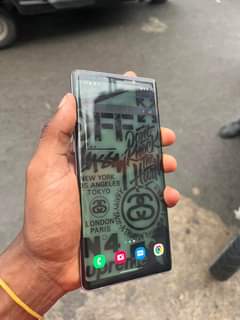 A picture of Samsung note 9 128gb kama unavoiona inatumika kama kawaida 295