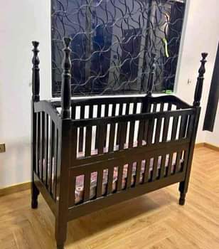 A picture of Baby cots already available at 0705835787