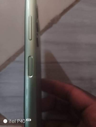 A picture of Samsung a14 original no crack no dot still new wish