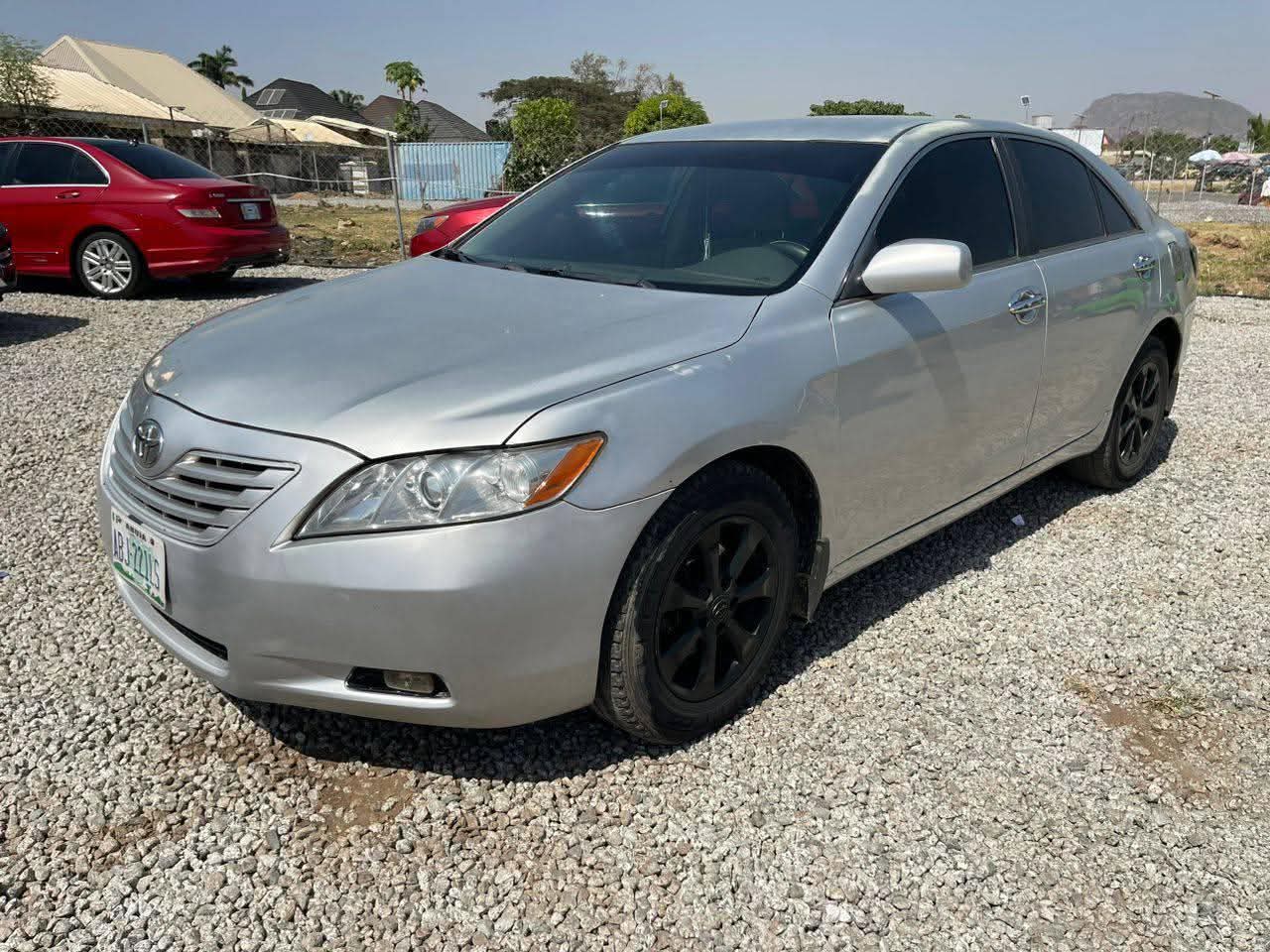 A picture of Super sharp 2008 Toyota Camry with untempered engine and gear