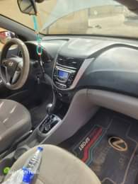 A picture of 2013 HYUNDAI ACIENT FIRST BODY SUPER GLEAN engine and gear